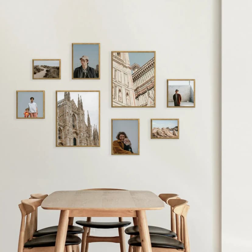 Modern dining room with gallery wall featuring family and travel photos in natural MDF frames
